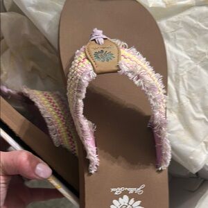 Yellow box flip flops